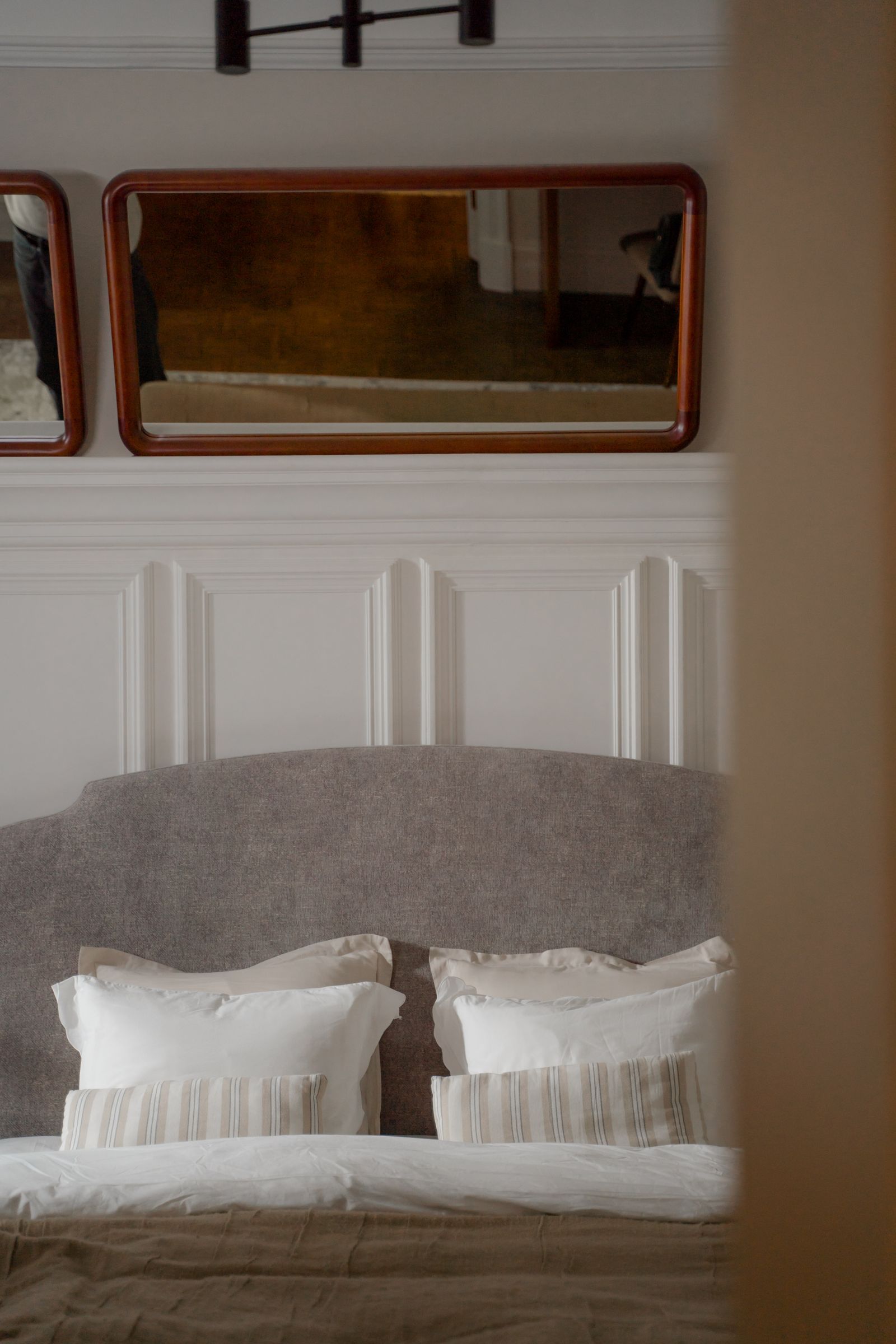 Neutral linen bedroom prepared by a Luxe housekeeper