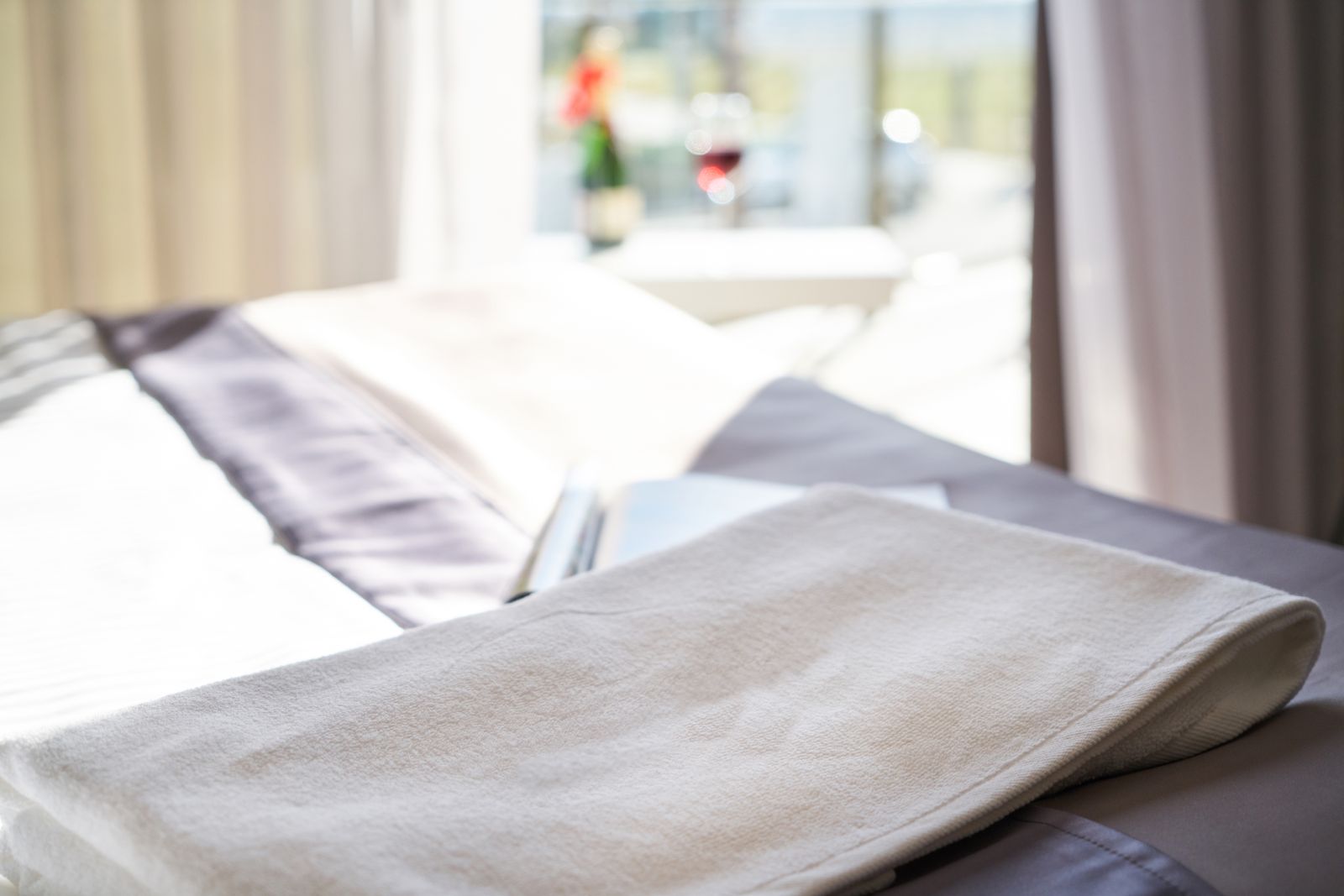 Fresh towels set out in a guest suite